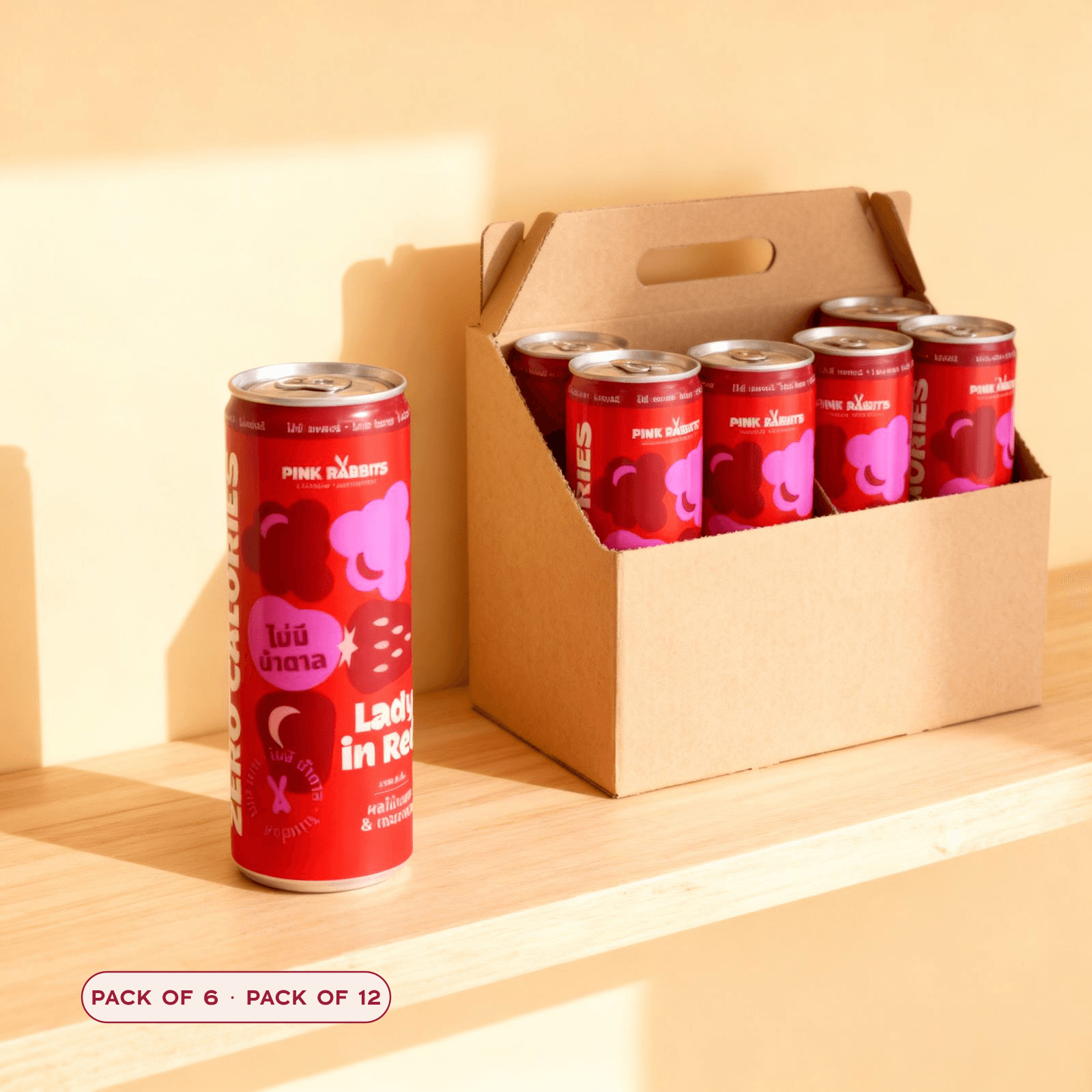 Lady in Red hero can beside a cardboard multipack carton of cans on a shelf